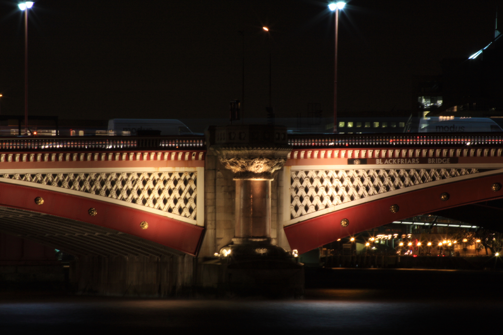 Illuminated bridge at night over the Thames