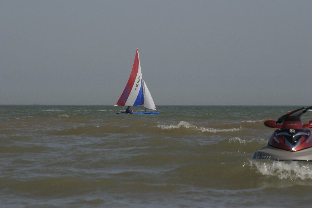 Pleasure boat sailing in the sun at Clacton-on-Sea.